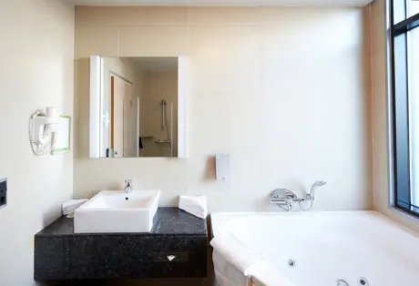 Junior Suite Bathroom at Hotel Reykjavik Grand 