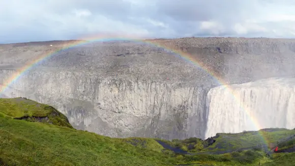 A rainbow across Dettifoss waterfall on the Diamond Circle